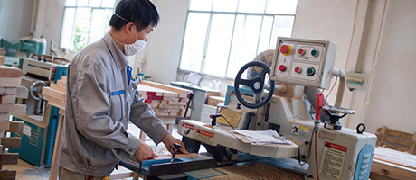 Custom hotel furniture factory with advanced production equipment and modern workshop environment